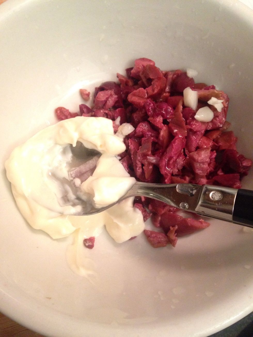 While the burgers cook - mix the chopped olives garlic paste and lemon