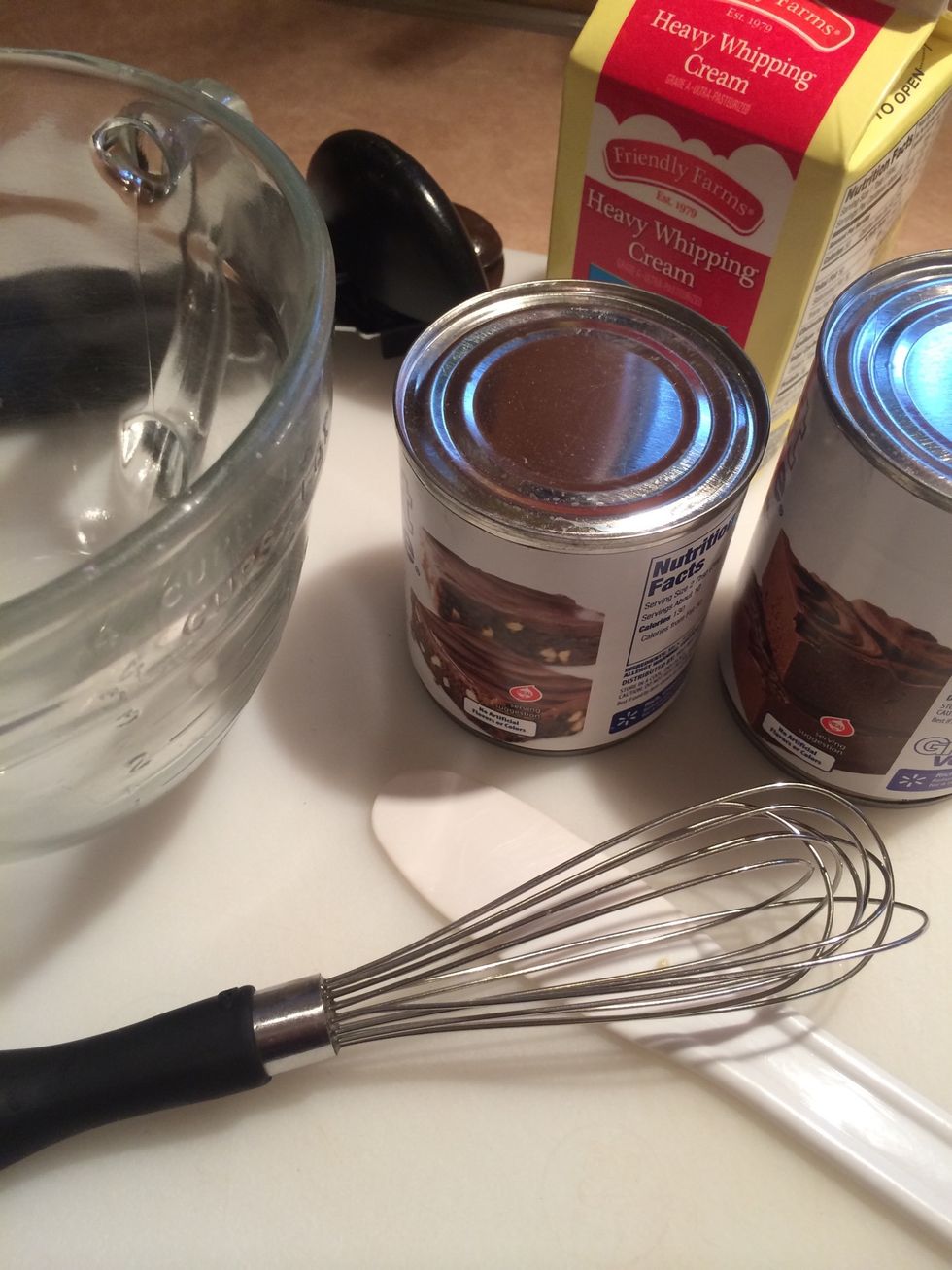 While the cake is baking, prepare the three milks.