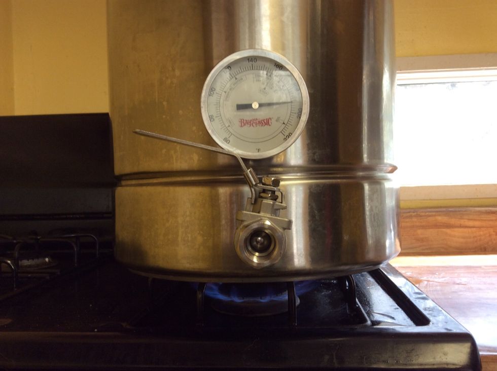 While the carboys clean, heat the wort to 180-200 degrees. Turn off the heat at this point.