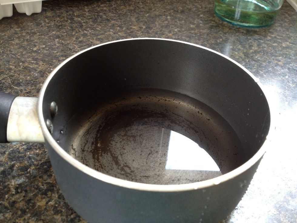 While the cheesecake bakes, prepare the mousse by assembling a double boiler. Start with a pot with about an inch of water in the bottom.