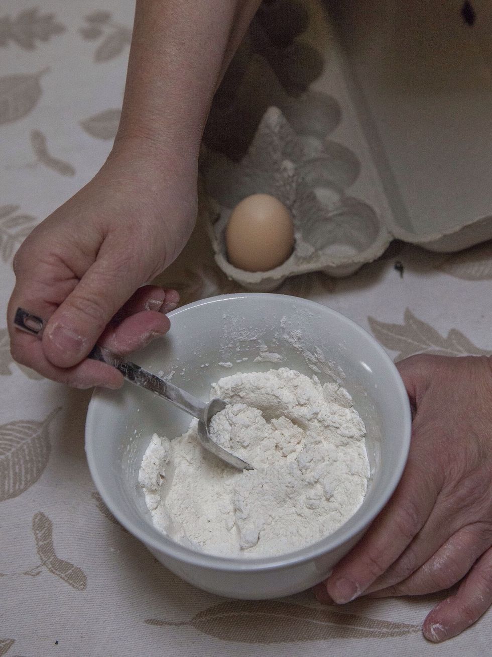 While the chicken is chilling, mix together the gluten free coating. 5 Tbs cornstarch, 2 Tbs sorghum flour, 1 Tbs rice flour . Beat the egg and set it aside in a separate bowl.