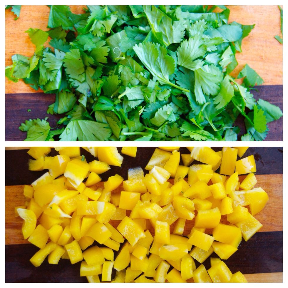 While the chicken is cooking, chop the cilantro and bell pepper then add them to the mixing bowl.