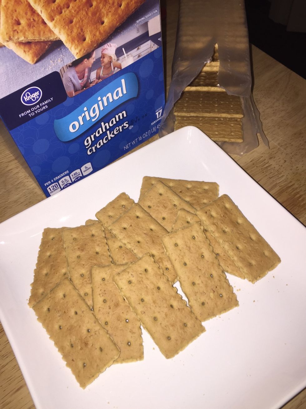 While the dish is baking, break the graham crackers into pieces fit for dipping.