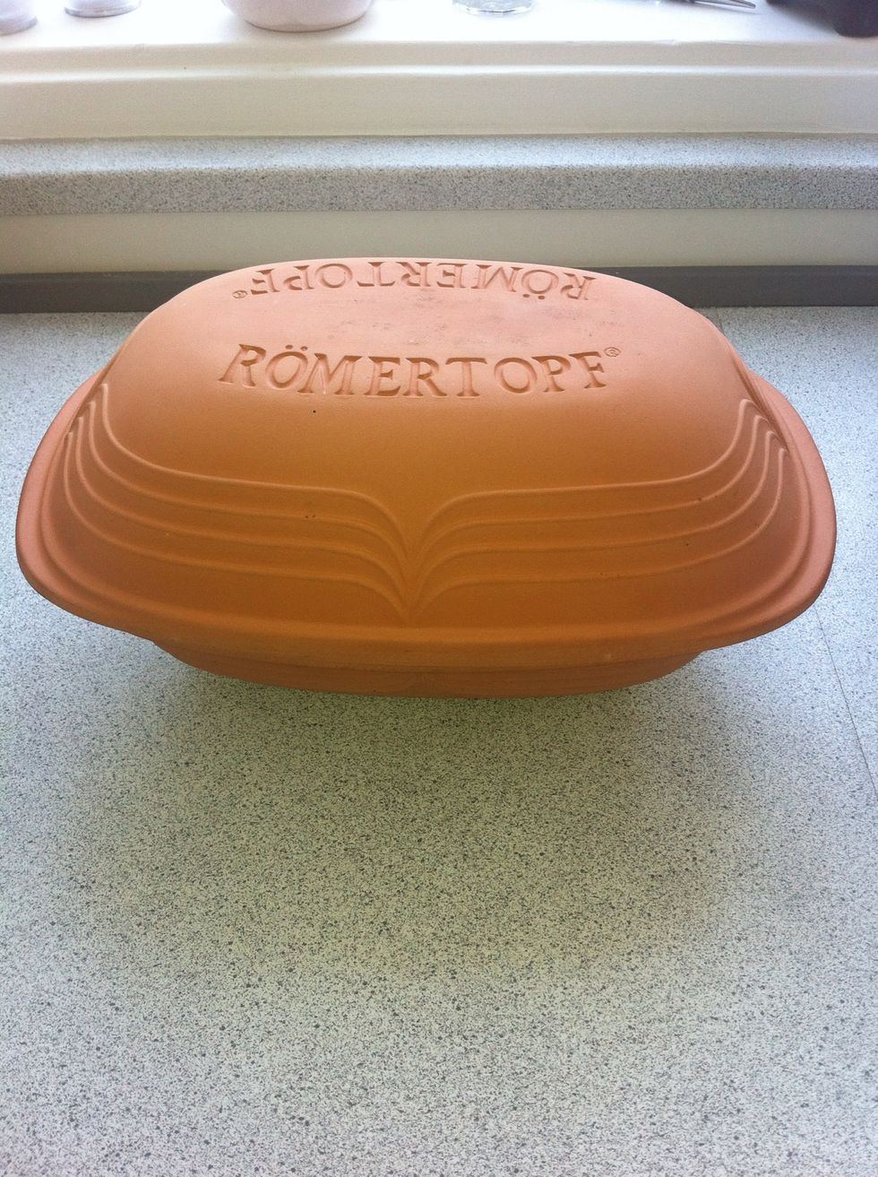 While the dough is proving, put your pot and lid in the oven and turn it on. Set it at 250\u00b0 C or 482\u00b0 F. You can use any pot as long as it, or parts of it, does not melt. I use a clay roaster.