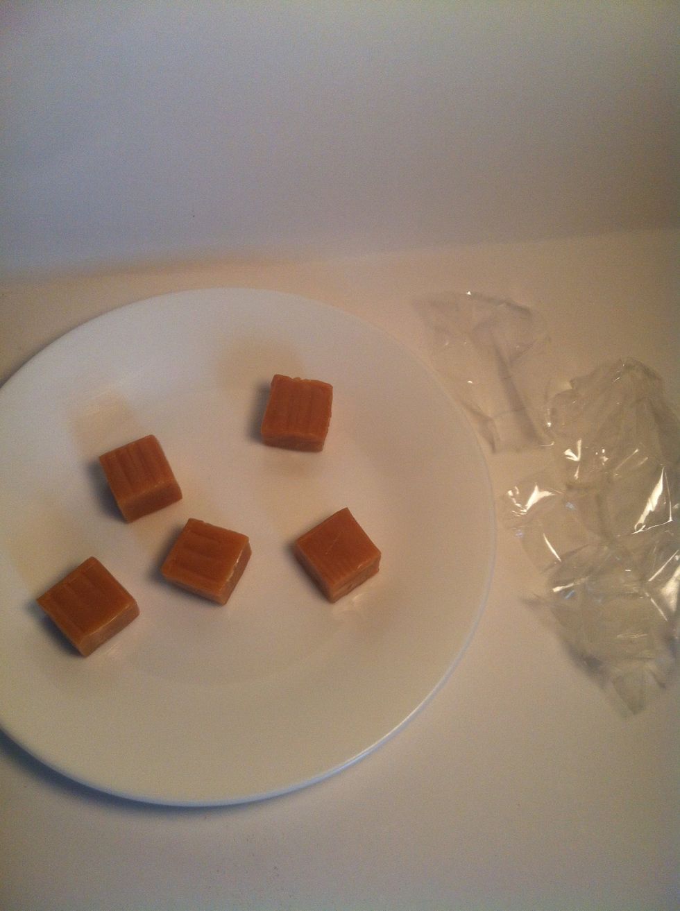 While the drink is in the microwave, let's prepare our caramel :) First, un-wrap the caramel and place on a plate (You really only need 3, i miscounted at first)