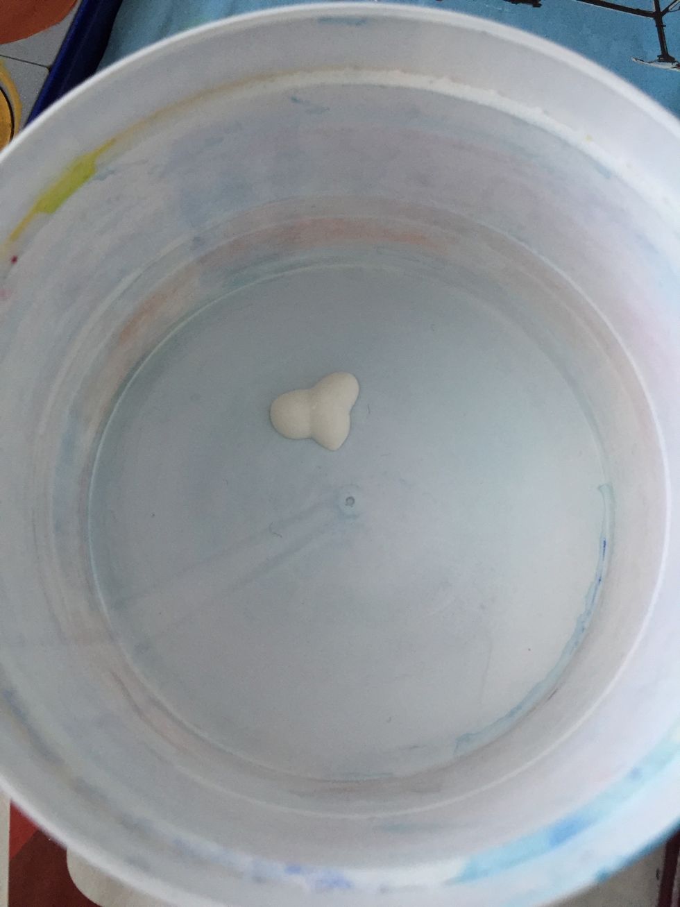 While the frisket is drying, you can start mixing your watercolors. I used blue and green.