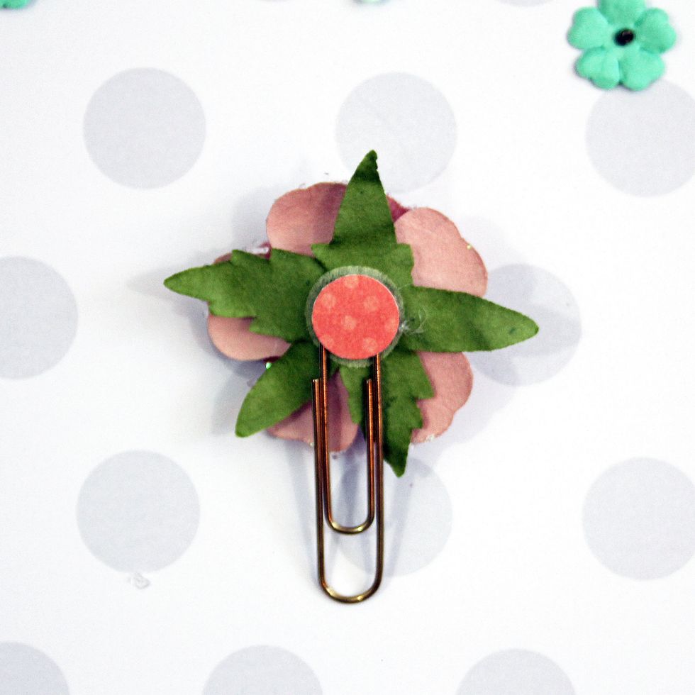 While the glue is still wet, add a small circle to secure the flower.