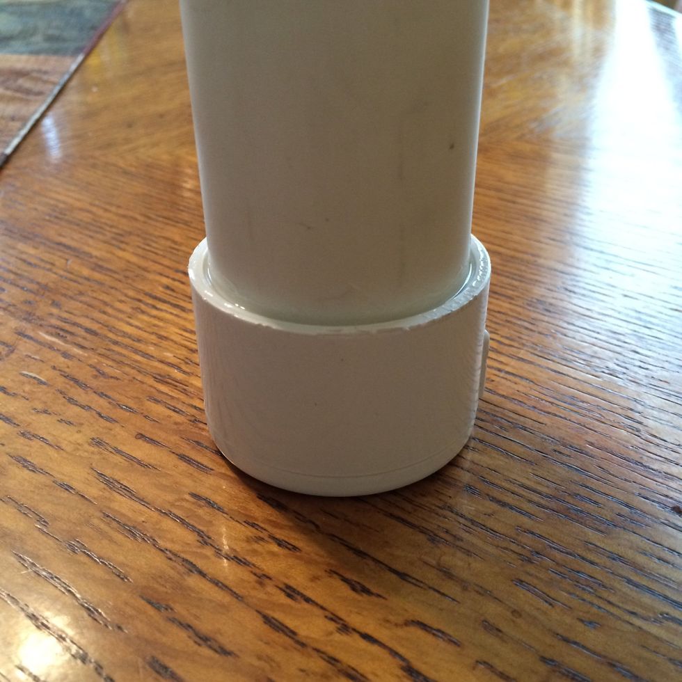 While the glue is still wet, twist the unthreaded cap on to the glued end as far as it will go, and allow to cure about 5 minutes.