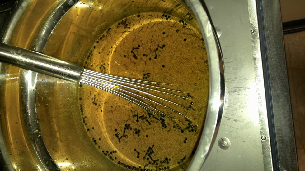 While the jars are steaming, bring the sugar, vinegar and spices to a boil.