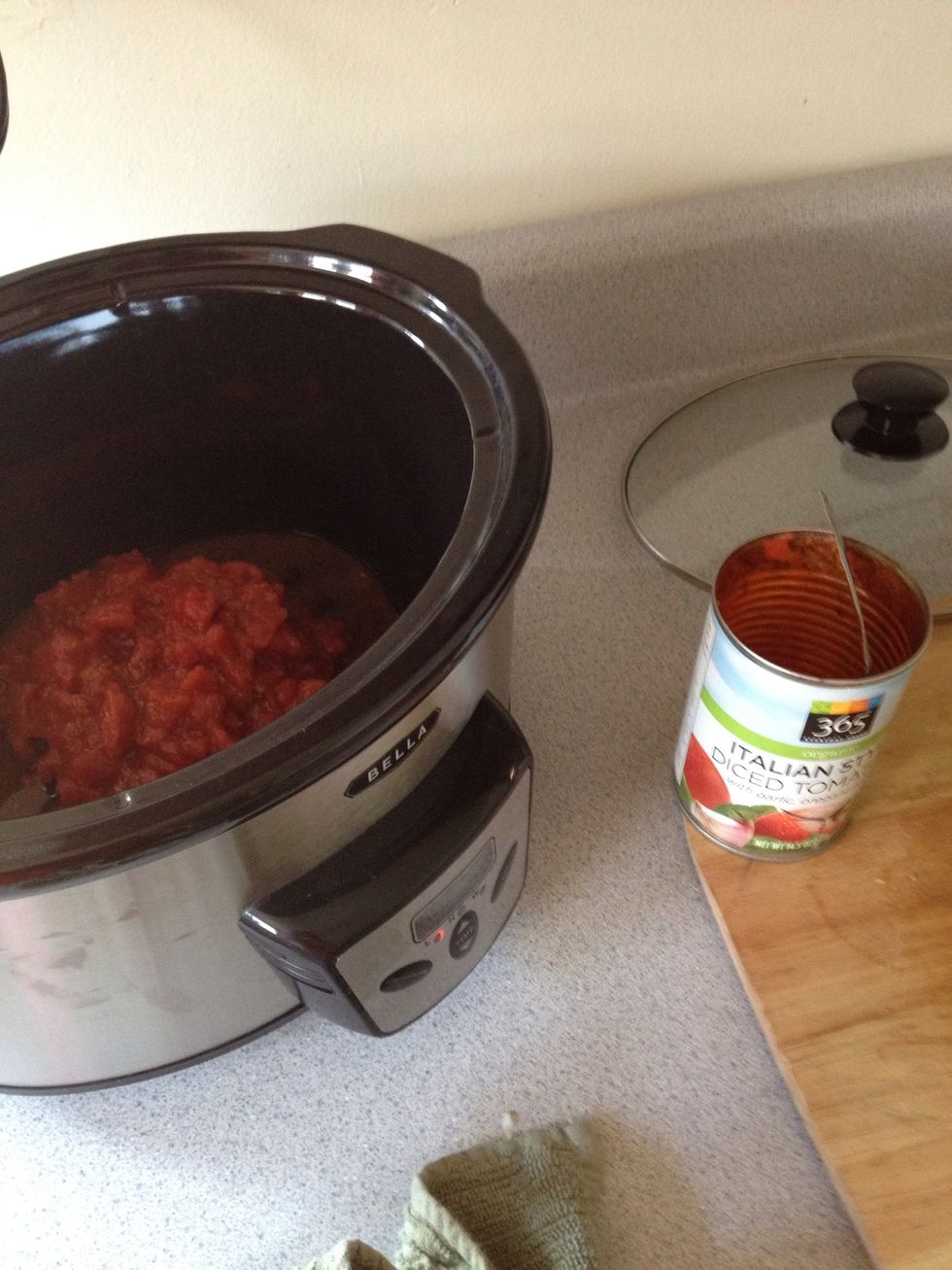 While the meatballs cook, start the sauce. You can use any sauce you like, any variation of tomato. Use two cans. I used one can of this and...