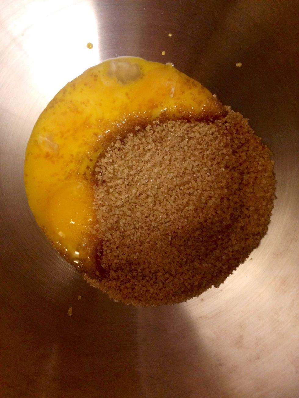 While the milk/cream mix is heated up whisk the egg yolks and the sugar, preferably in a metal bowl.