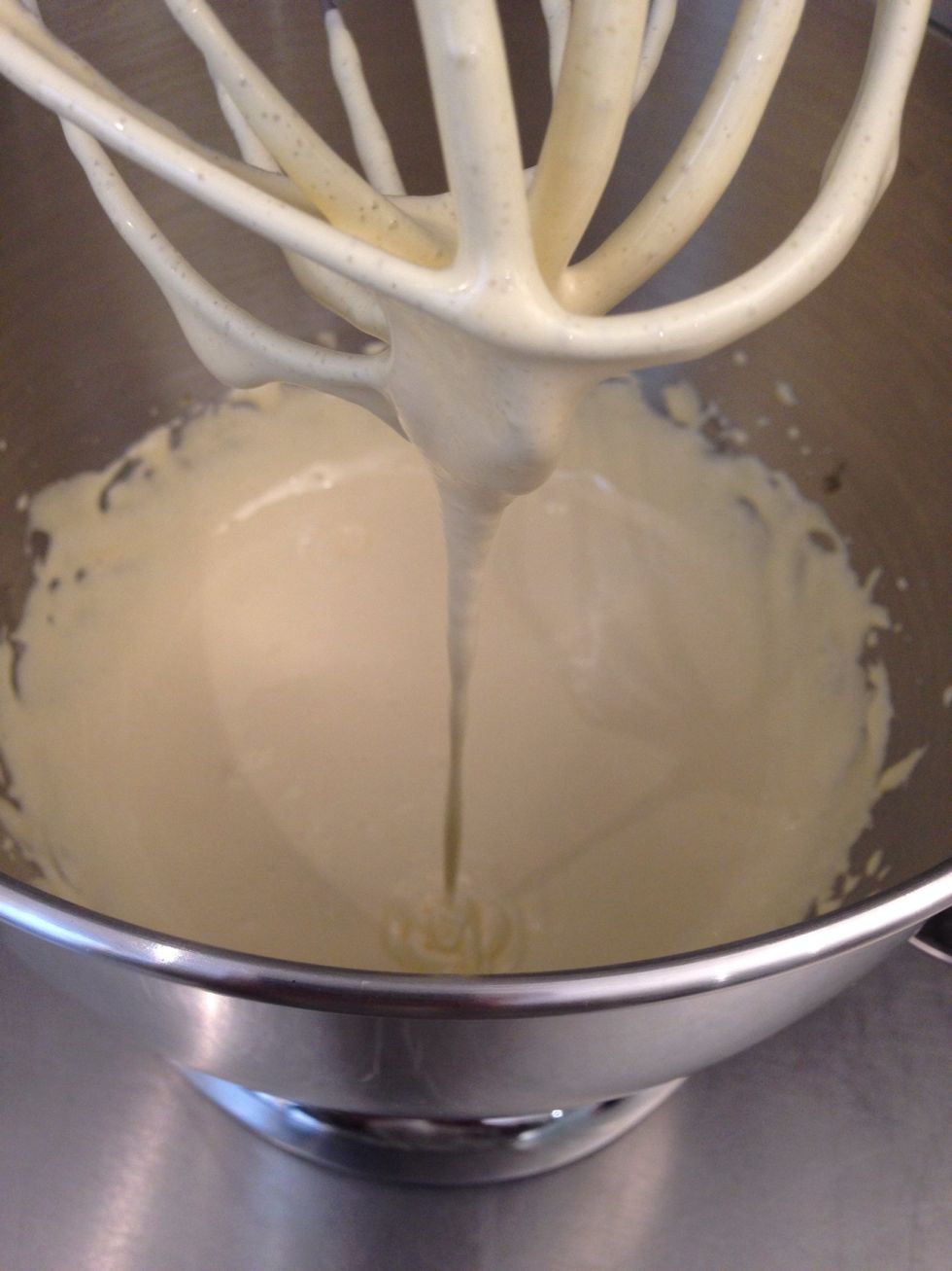 while the mixer is on add the boiling milk over the egg mixture. Then put all back in the casserole. let it become thick 'custard' stirring constantly, on very low fire. Add 160 gm chocolate