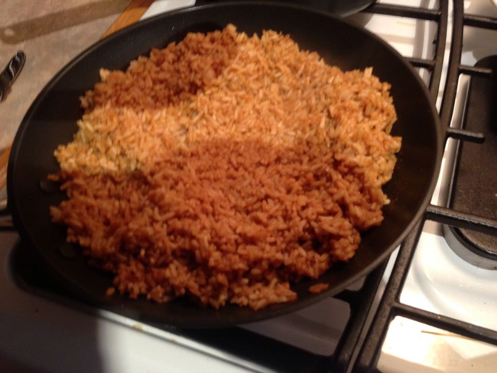 While the mushrooms are cooking fry rice with butter and soy in different pan