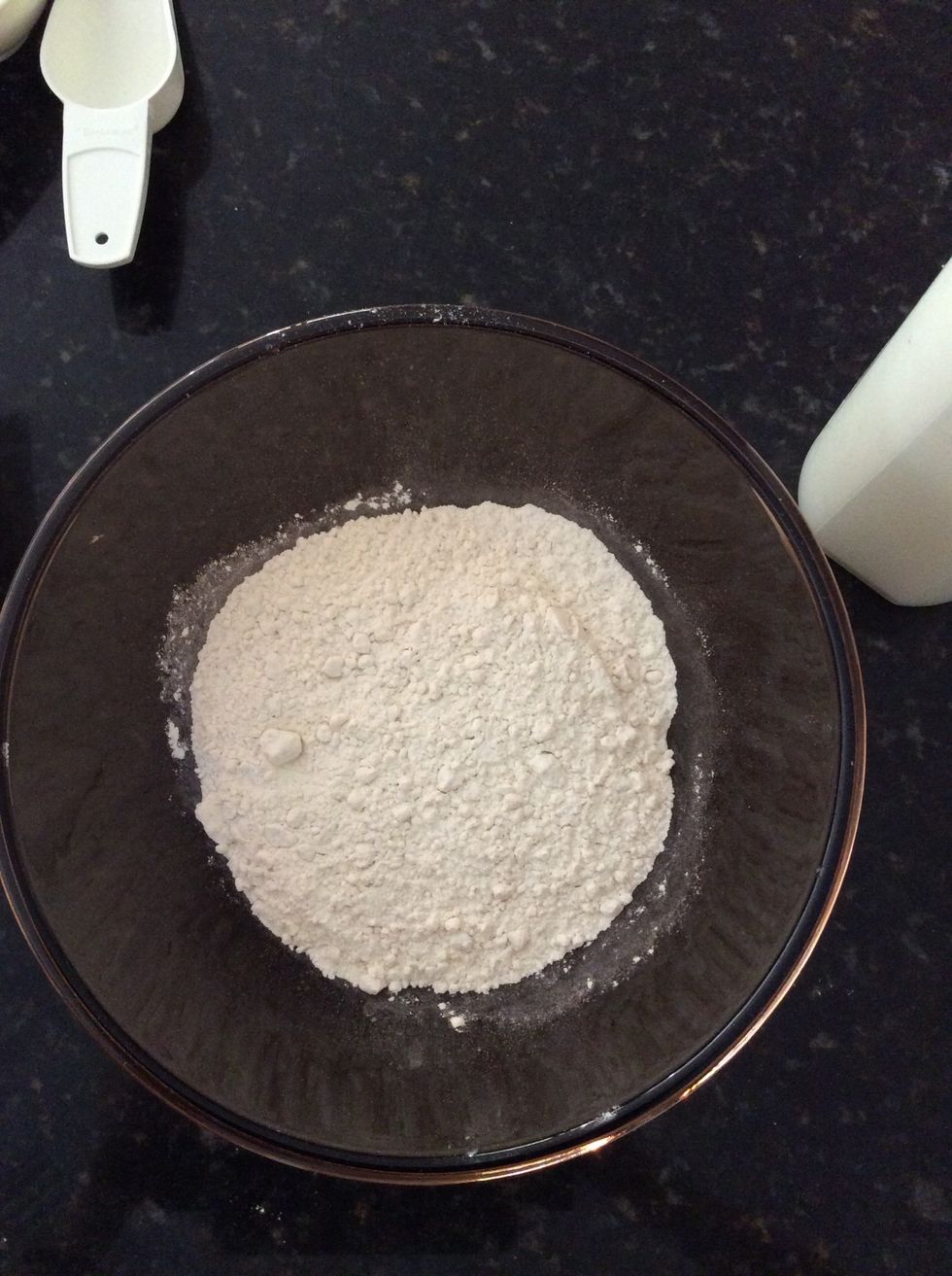 While the Nutella disks are freezing, add 1 1/2 cups of plain flour into a large mixing bowl.
