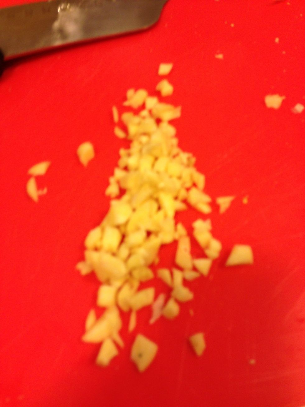 While the onion is cooking chop the garlic