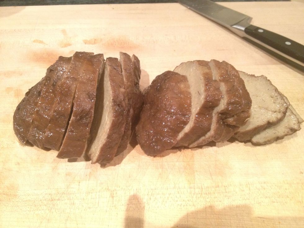 While the onions are cooking, slice the seitan into 1/2 inch thick pieces.