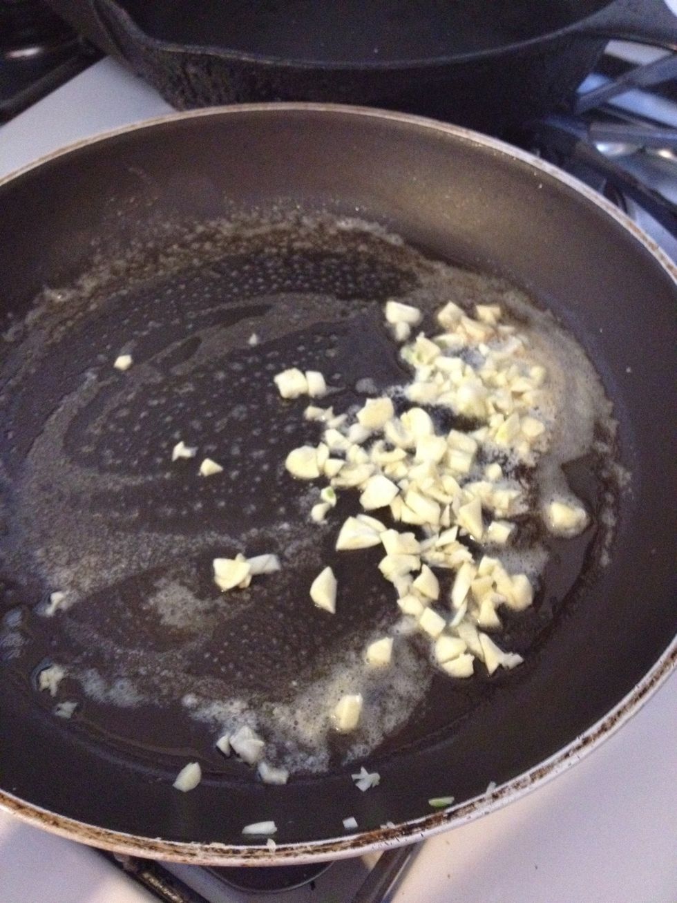 While the pasta is cooking, let's prepare the sauce. The sauce will be ready just when the pasta is ready. First, melt about 2 tablespoons of butter in a pan and saut\u00e9 the garlic.