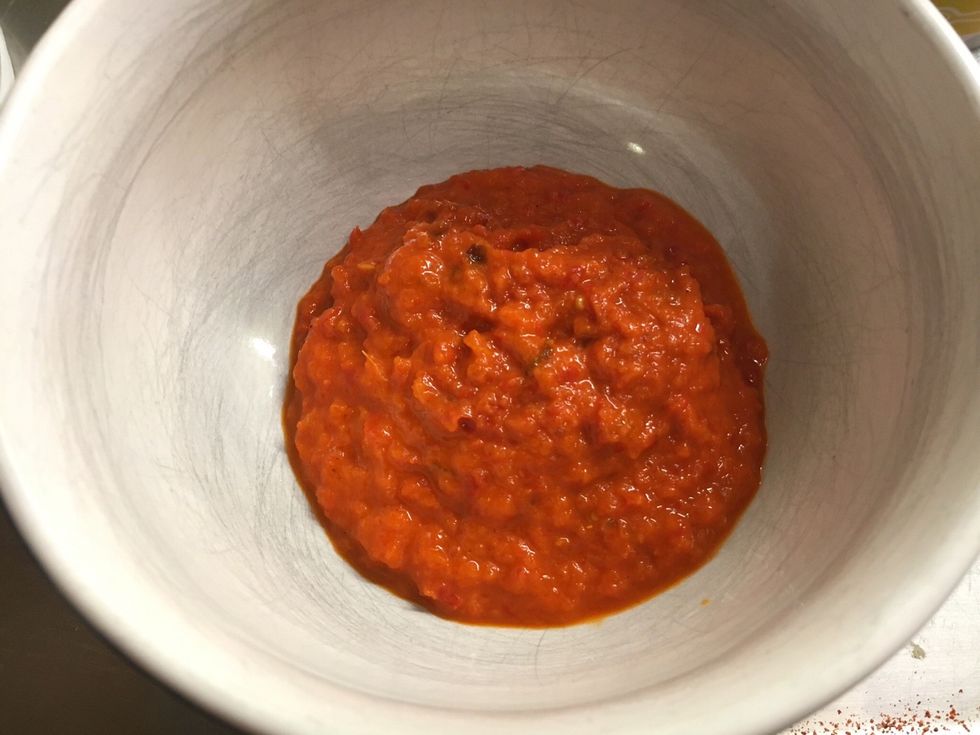 While the patties are on the stove, prep the sauce. Mix Turkisk or Greek yogurt with ajvar, sambal oelek, a splash of lemon juice and salt & pepper.