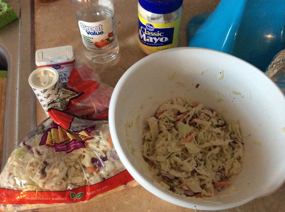 While the pork is finishing up go ahead and make the slaw. It needs to marinate for an hour but it's just mayo, vinegar, salt and pepper. I used the pre made slaw mix
