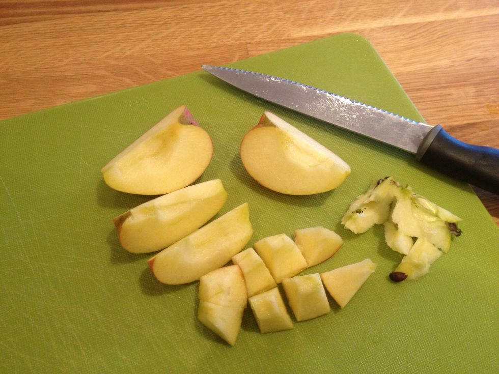 While the porridge is cooking. Take the core from a quartered apple and dice