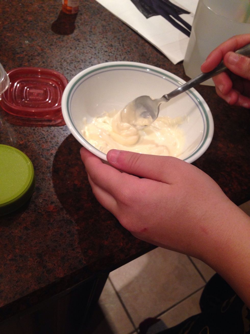While the potatoes are in the oven, add mayo into a separate bowl for the sauce