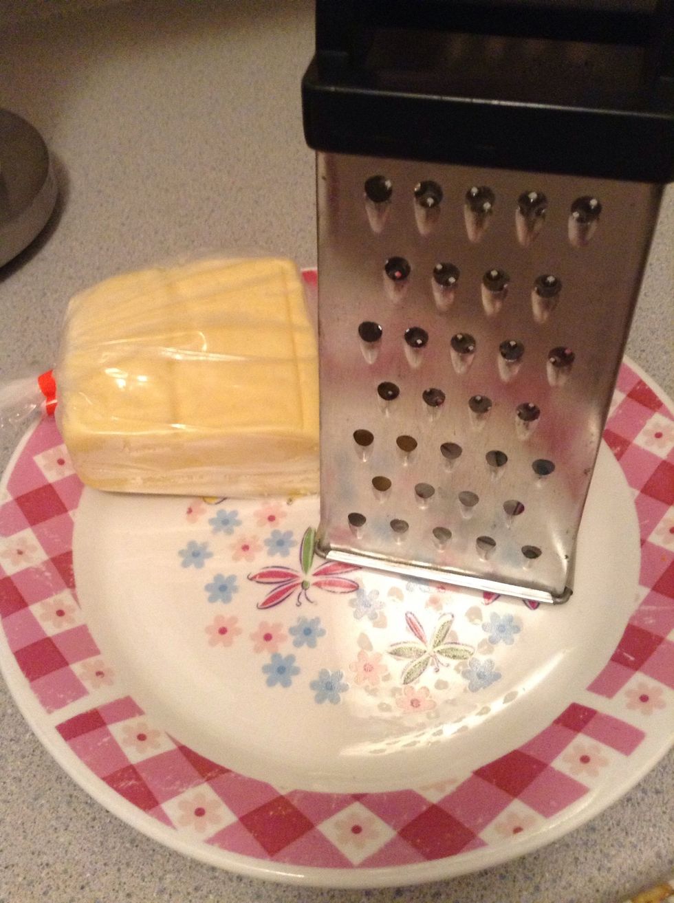 While the potatoes, baked beans and Bok choy are on the fire.. Grate your cheese ( if you buy shredded like I usually do ... Skip these steps)