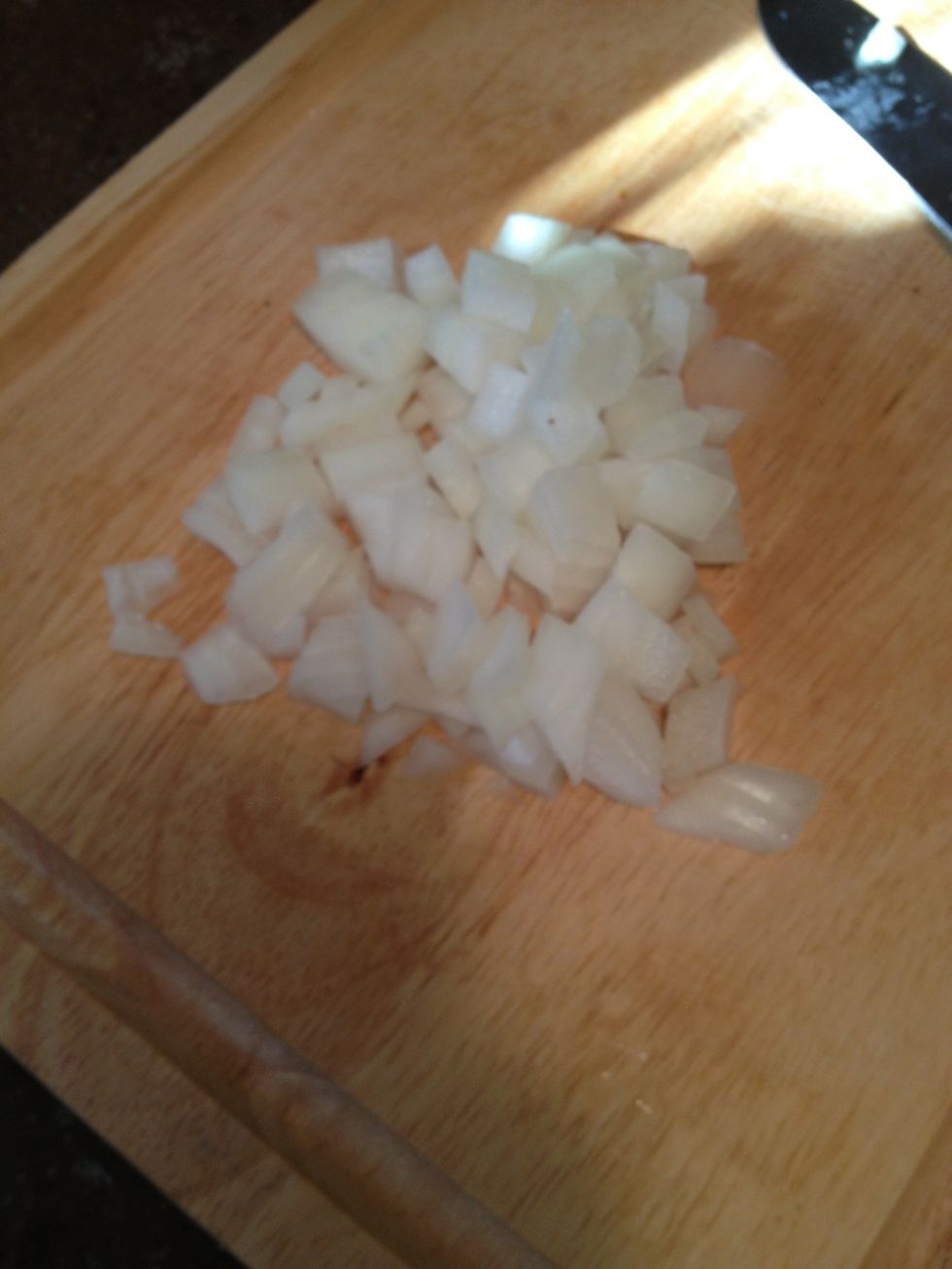 While the quinoa is soaking, chop up the onion!
