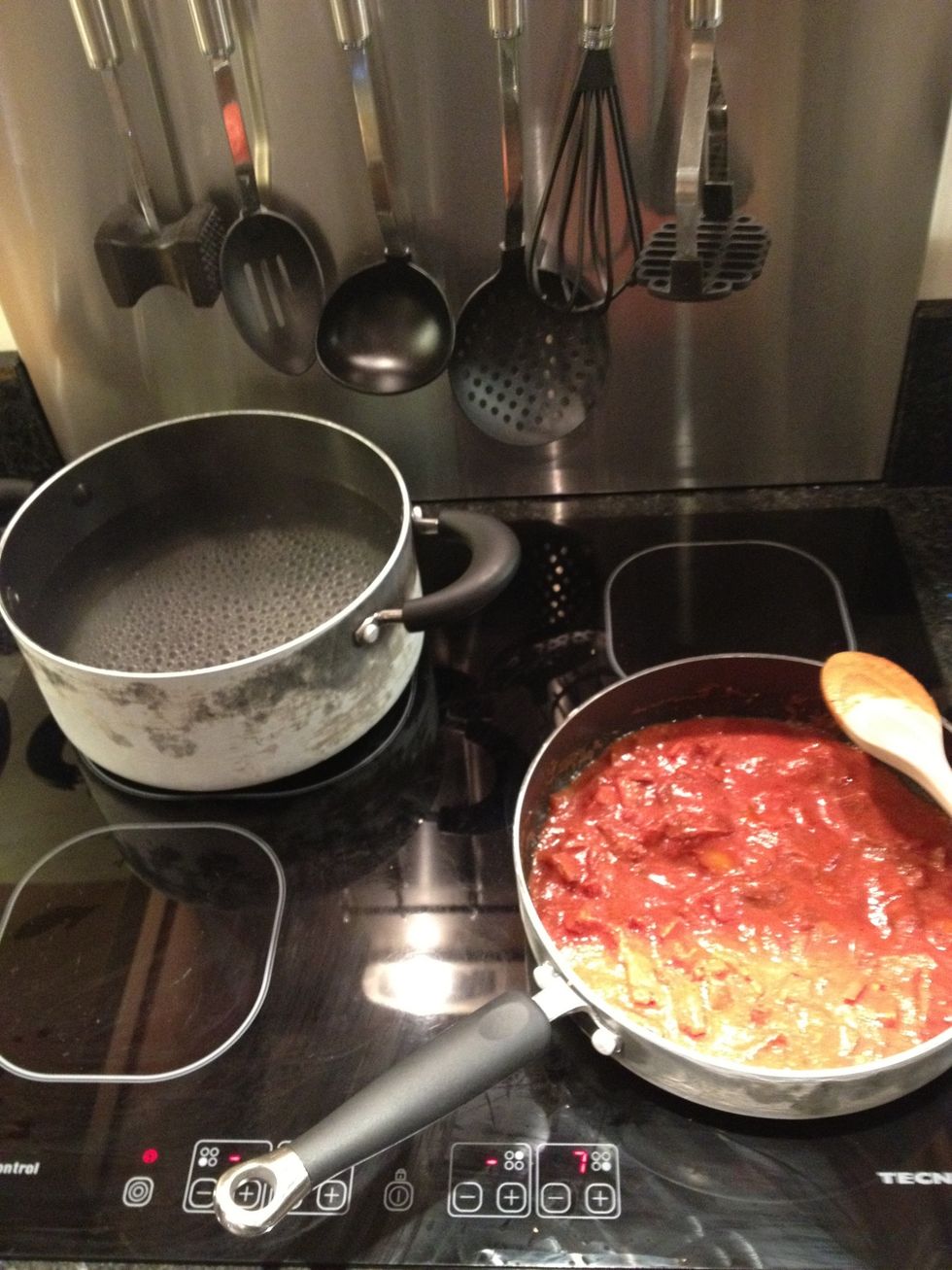 While the sauce is simmering away, get the water for the pasta on. After the sauce has been simmering for about 15 - 20mins, chuck the pasta into the boiling water.
