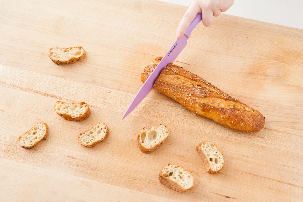 While the soup simmers, slice up your baguette into 1 inch pieces. Heat your oven to 400 degrees and bake baguette slices for 6-8 minutes, until bread is toasted and golden brown.