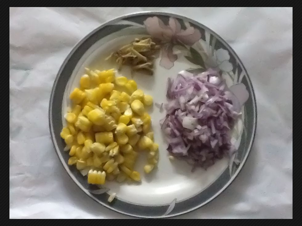 While the vegetables cook - get the cooked corn (half a cup), dice half of a medium sized onion, and slice around one teaspoon of ginger.