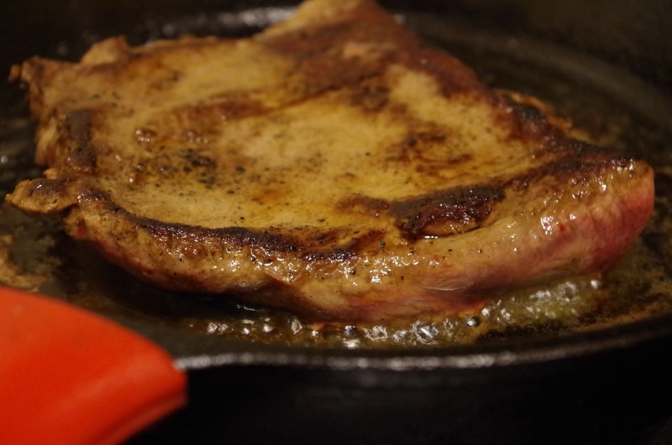 While the veggies are cooking, sear your (1/2 lb) steak over medium heat in a pan for 4 minutes on each side (medium rare). When finished let rest on a cutting board for 5 minutes before cutting.