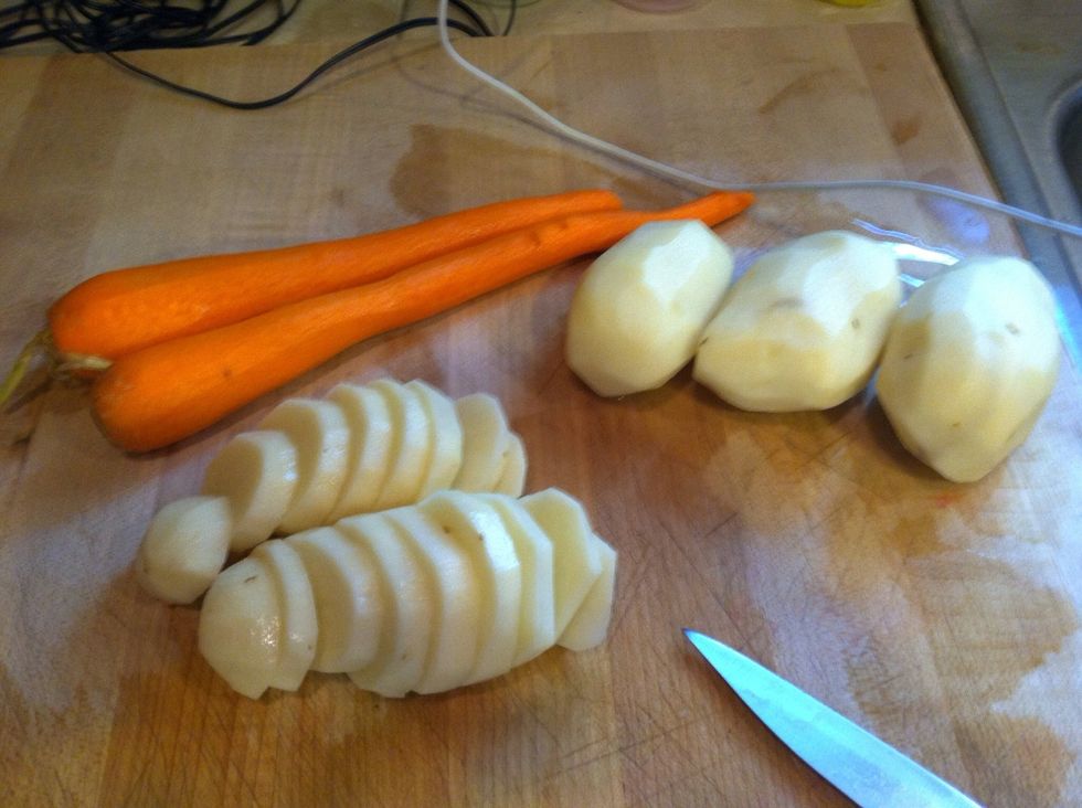 While the water boils I usually cut the potatoes and carrots. Cut any shape you like