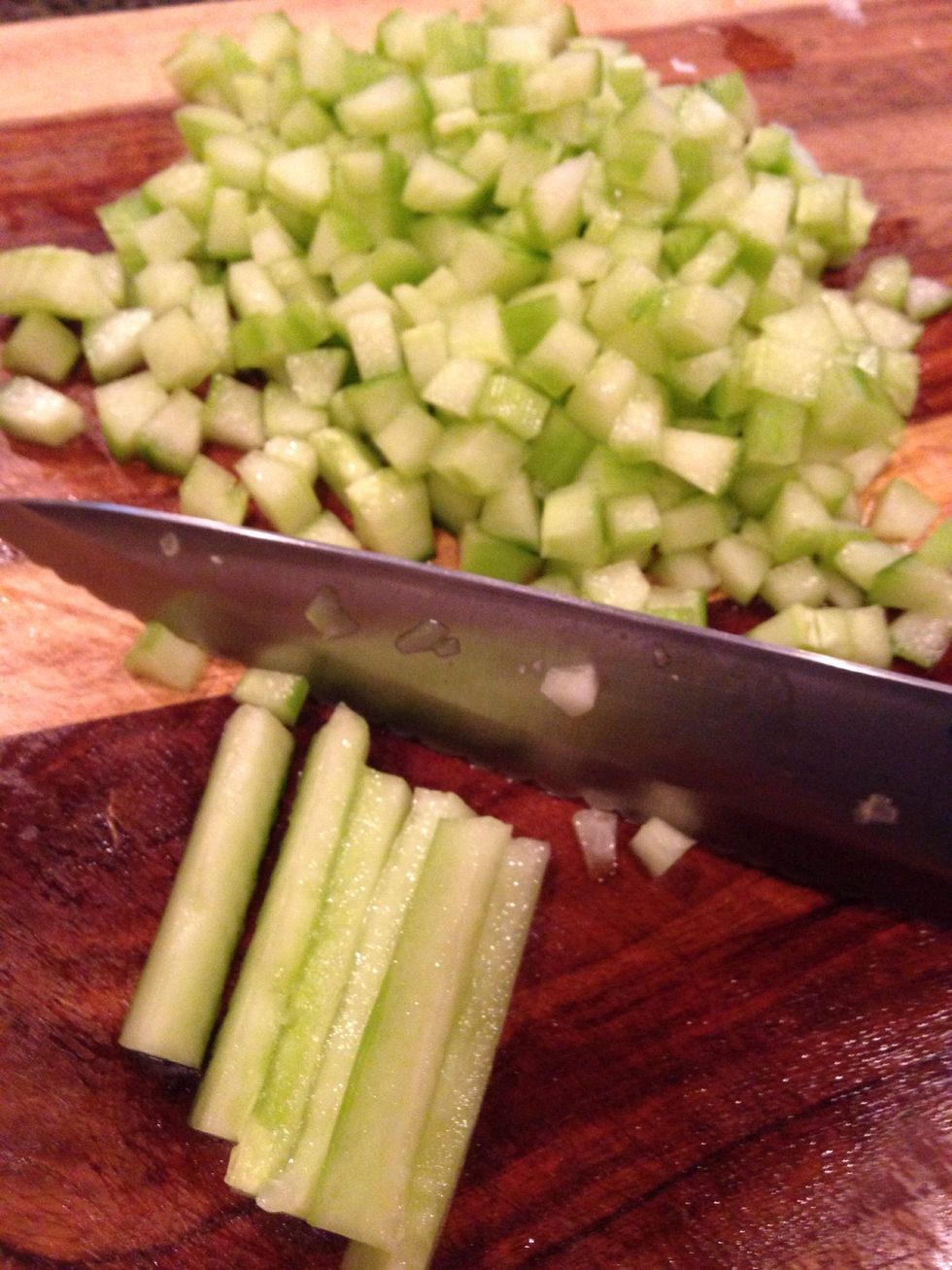 While the water comes to a boil, dice up your cucs, onion, garlic,