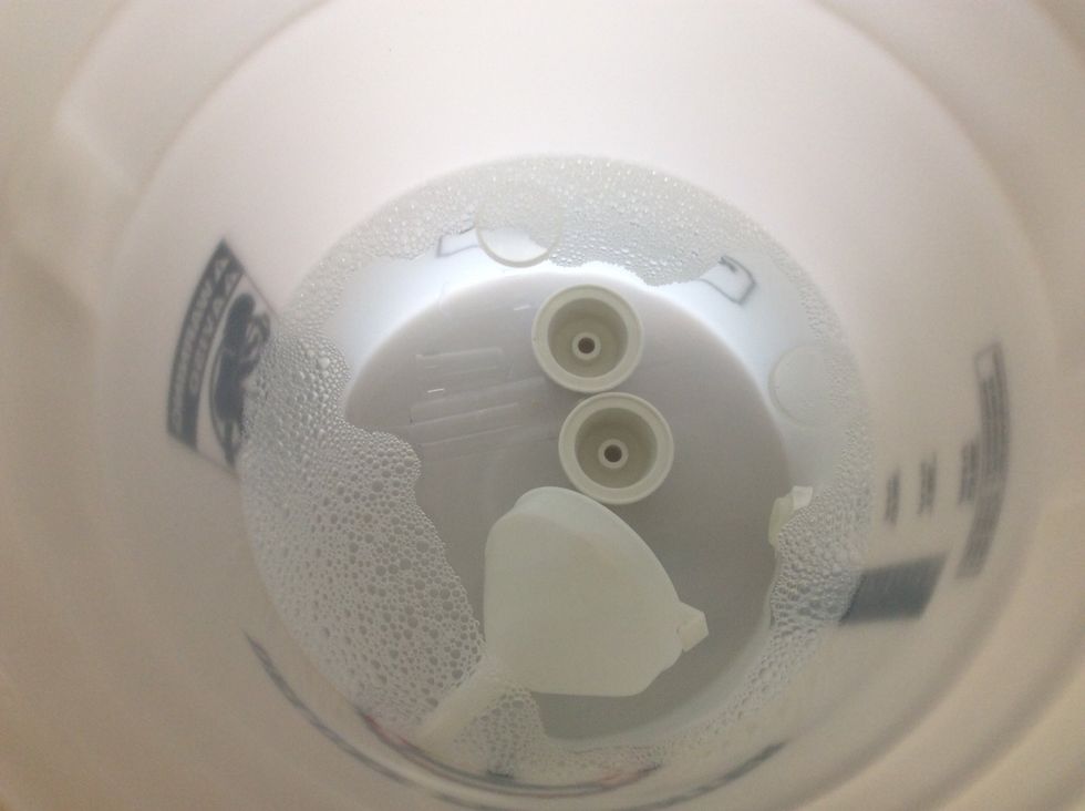 While the wort was chilling, I added some water and Starsan to my old fermenter bucket. In went the funnel, airlocks, and bungs.