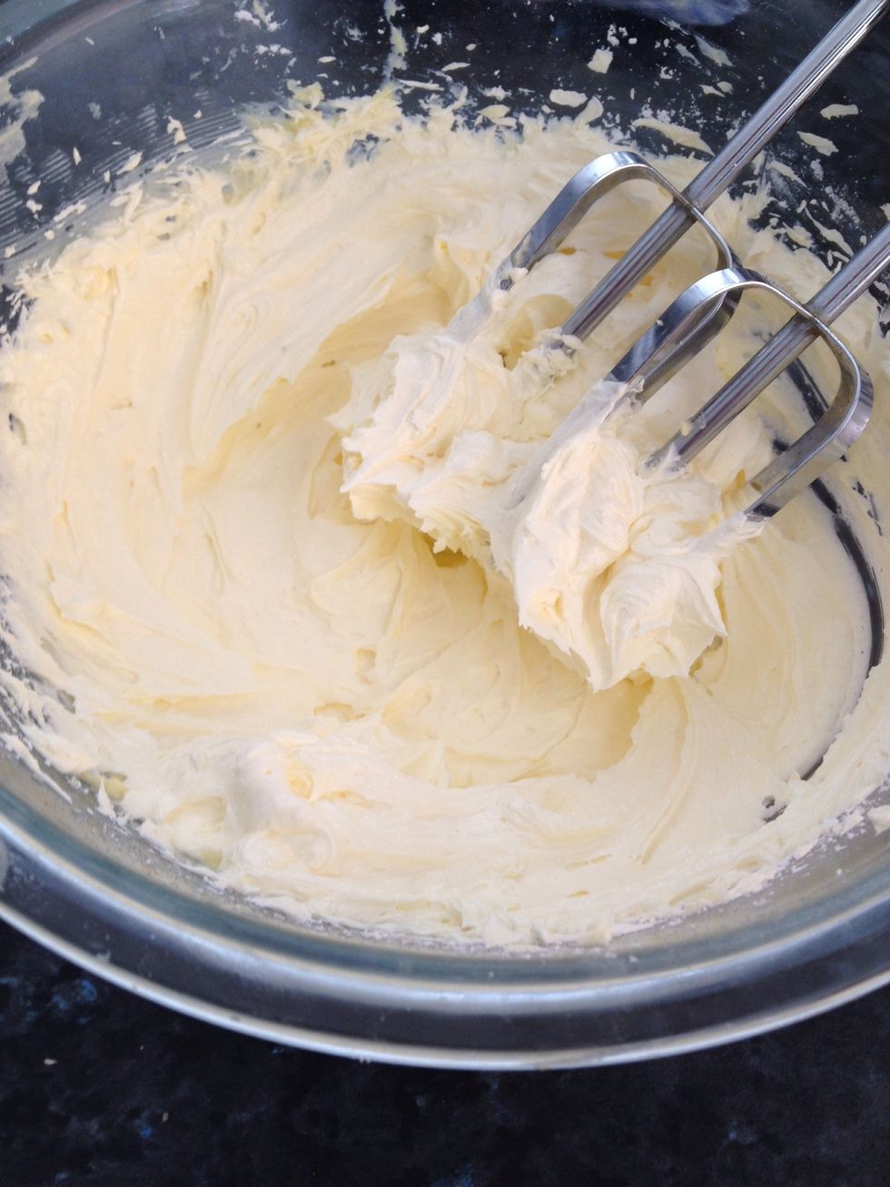 While they are sitting, cream the butter and icing sugar until the colour changes from a yellow to a near white. (I use salted butter because the taste is better, but you can use unsalted if you like)
