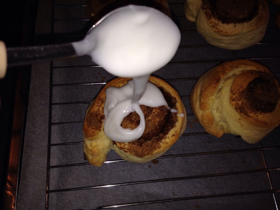 While they are still warm, drizzle the icing on top.