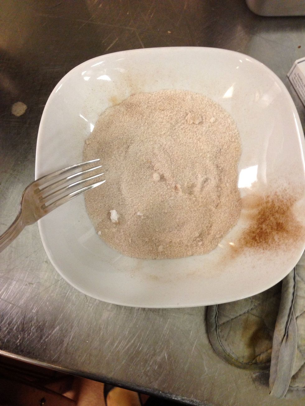 While they'r baking mix sugar and cinnamon in a bowl so you can cover the cookies