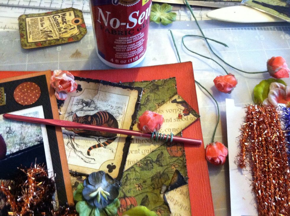 While thinking about flower placement, I wound the wire flower stems around a crochet hook in a cute coil.