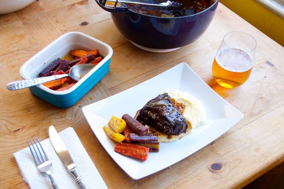 While this was cooking I roasted some rainbow carrots and made a creamy polenta with ricotta and parmesan. See our other 2 guides for the recipes. Plate the ribs with the polenta and carrots.  Enjoy!