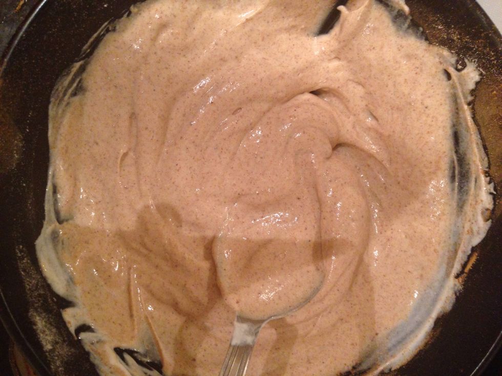 While waiting for the dough/pancake to cool down, make icing: 1/2 scoop vanilla whey, 1 tbs cinnamon, 2 teaspoons almond butter, 1/2 cup greek yogurt