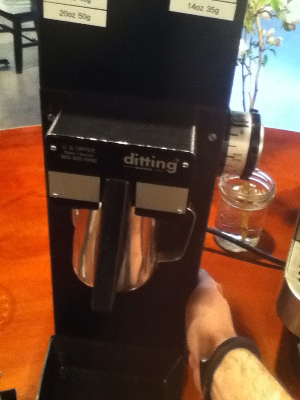While warming, grind the coffee on a medium coarse setting