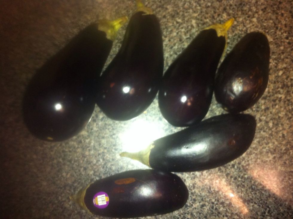 While we brown the meat,, take the eggplants and rinse under cold water.
