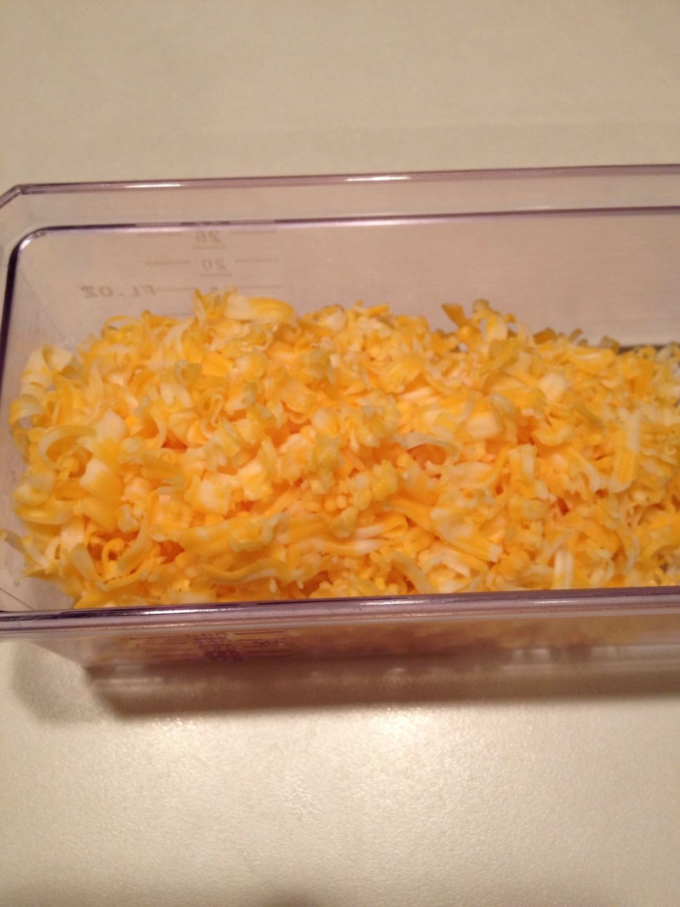 While you are waiting, shred your cheese.