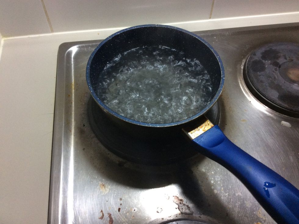 While you are washing your leaves boil hot water in a saucepan.