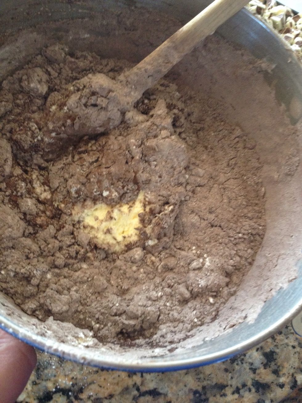 While you gently stir this in, add 1 1/3 c whole milk