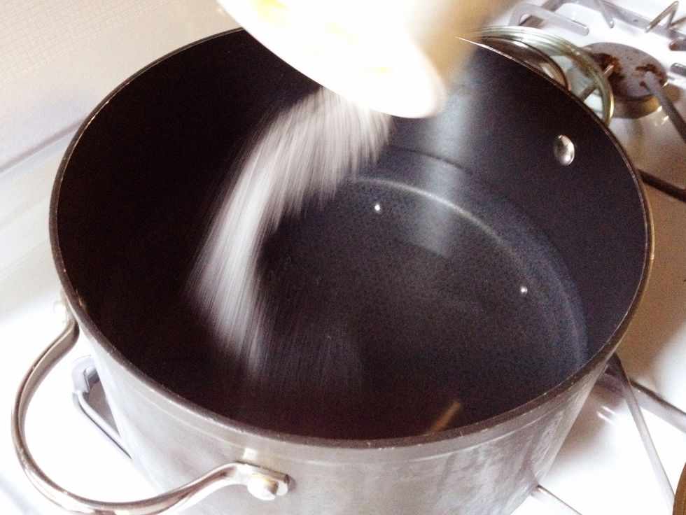 While you're chopping up the bacon, cook the pasta. Heat 4 quarts of water and the salt to a rolling boil.