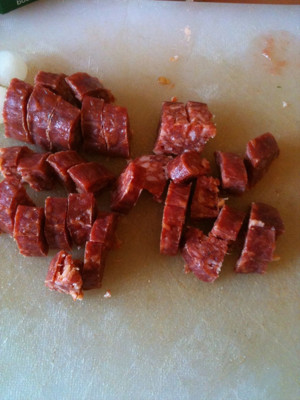 While you wait for 5 minutes, slice the chorizo....