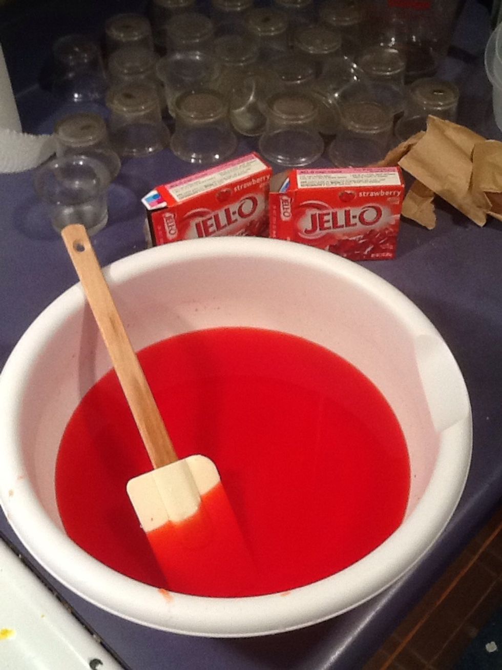 While you wait for the cake to cool COMPLETELY, make your jello mix. This should make 4 cups of jello liquid. Place in the fridge to cool for 3 minutes.