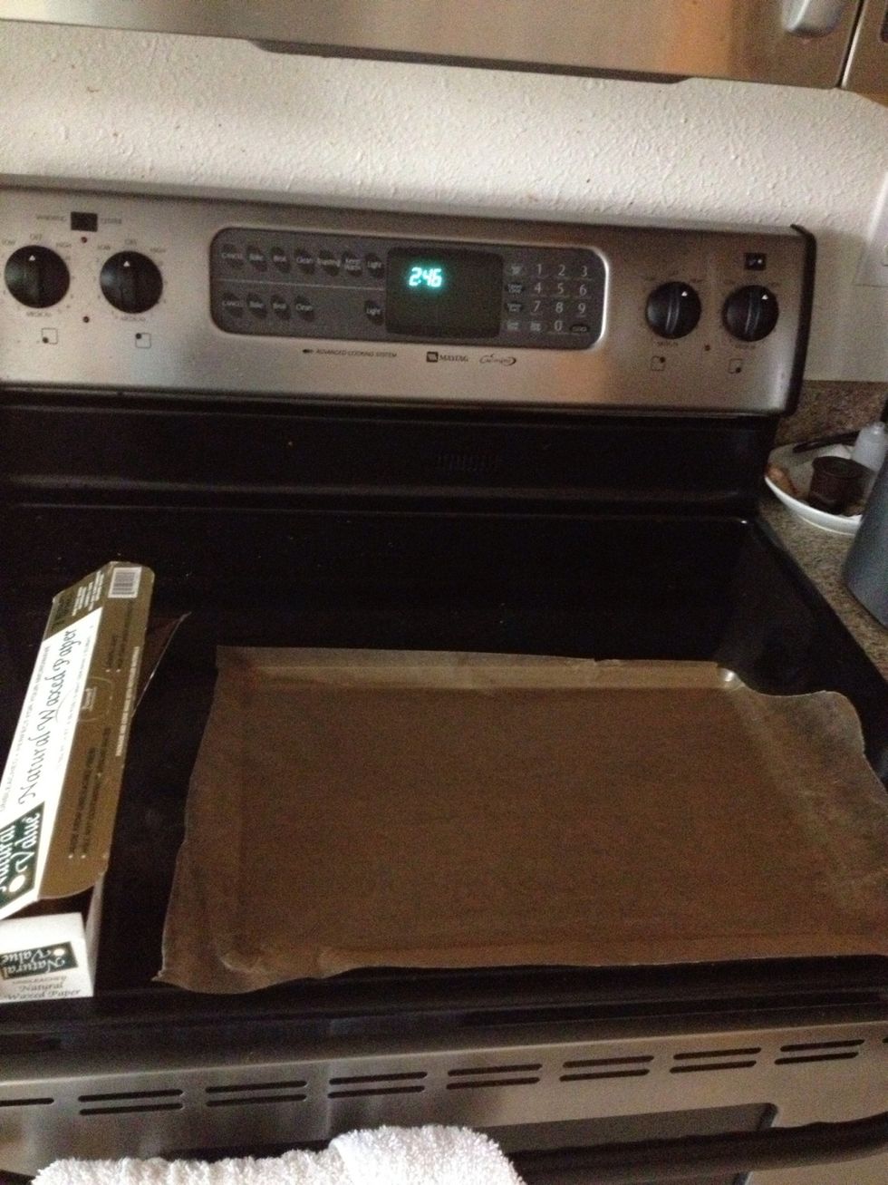 While you wait, rip off some waxed paper and line a cookie sheet with it.