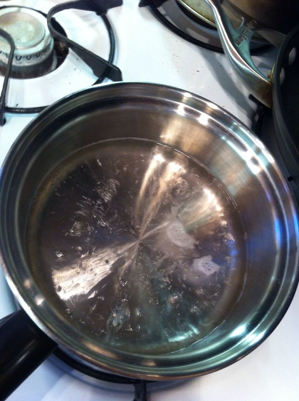 while your bottles are heating up an your equipment is sunken, grab your dextrose. it's basically sugar. boil one cup of water and pour your dextrose into it. let it dilute into a syrup. a minute